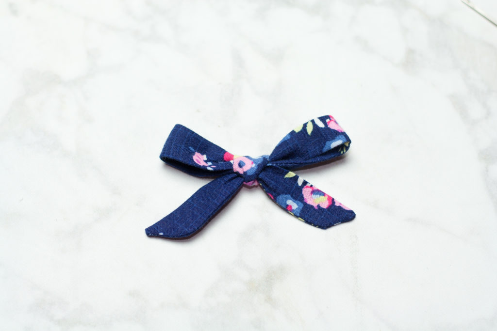 DIY Hair Bows: How To Make a Simple Hair Bow Sewing Tutorial featured by top US craft blogger, Sweet Red Poppy.