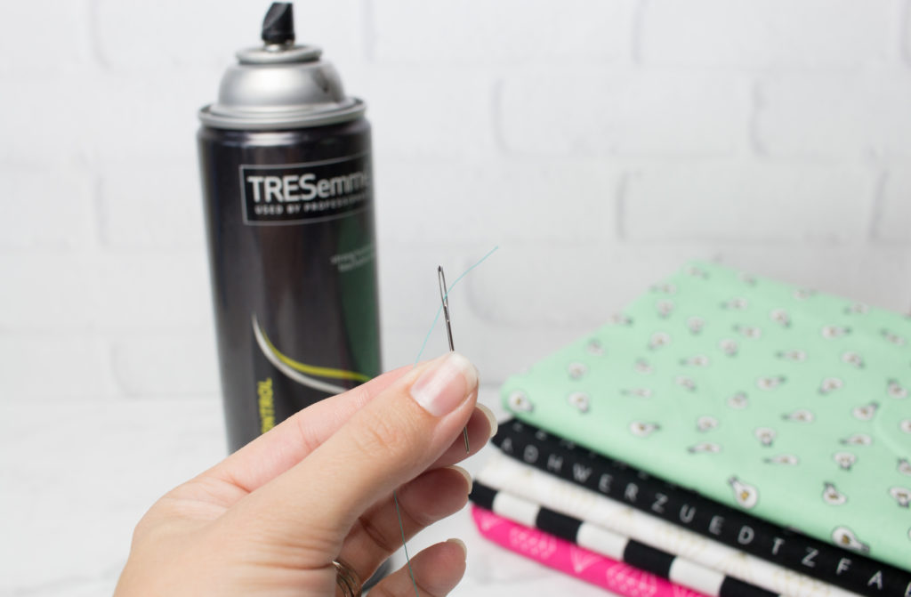 Easily thread a needle with the help of hairspray