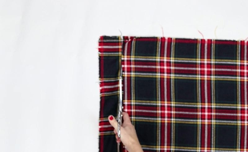 How to Make a No-Sew Plaid Blanket Scarf and Style it over 20 Different Ways, a tutorial featured by top US sewing blogger, Sweet Red Poppy.