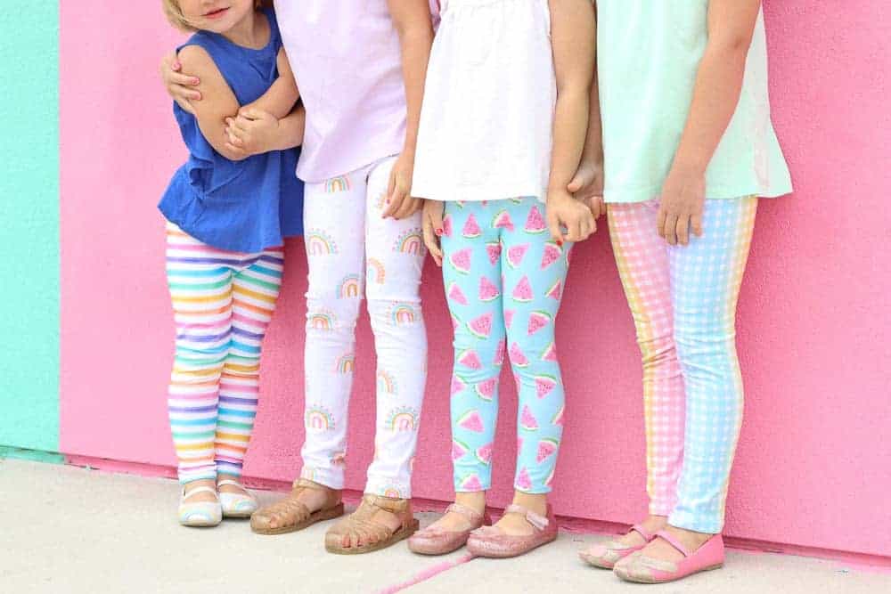 Leggings Pattern by popular US sewing blog, Sweet Red Poppy: image of young girls wearing stretchy leggings. 