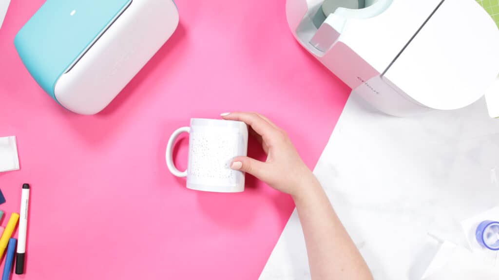 Cricut Infusible Ink Pens by popular US craft blog, Sweet Red Poppy: image of a woman holding a white ceramic mug