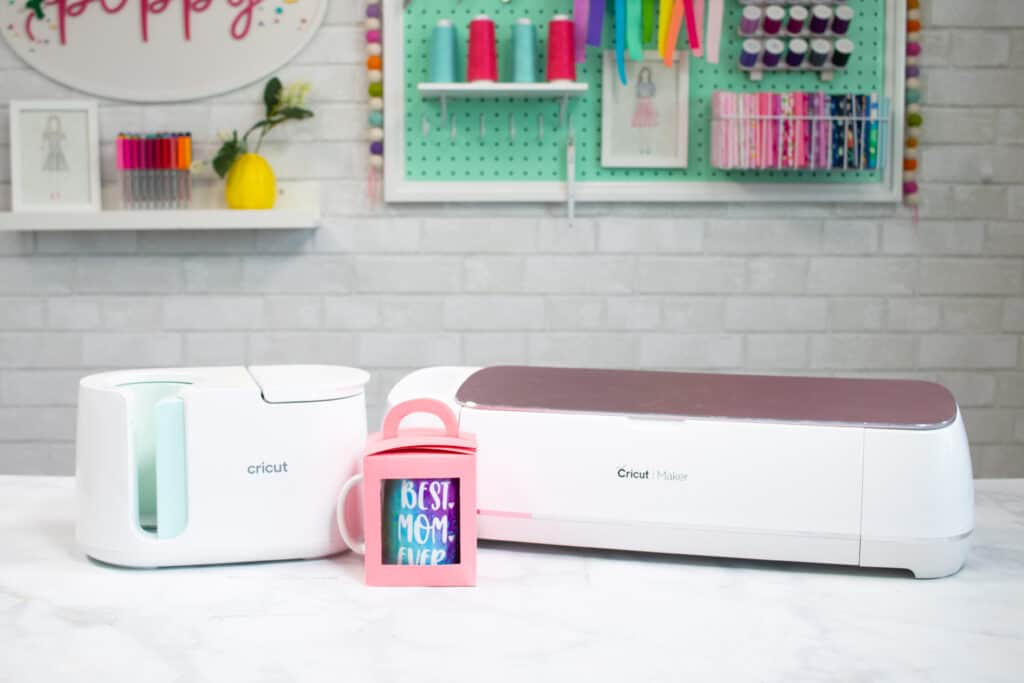 DIY Mother's Day Mugs |Mother's Day Mug by popular US craft blog, Sweet Red Poppy: image of a Mother's Day mug next to a Cricut machine. 