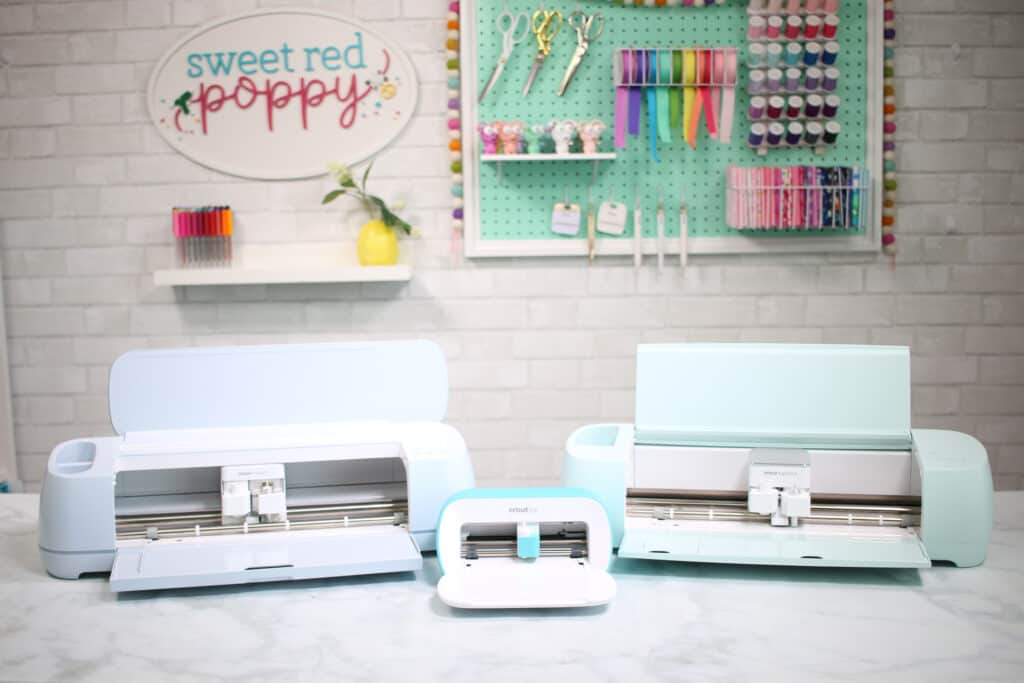 Cricut Maker 3 by popular US craft blog, Sweet Red Poppy: image of a Circut Maker 3, Cricut Explorer 3, and Cricut Joy. 