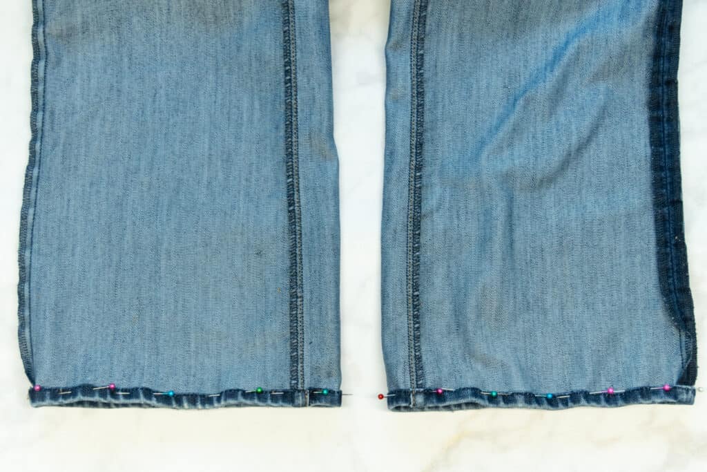 refold and pin the original jeans hem