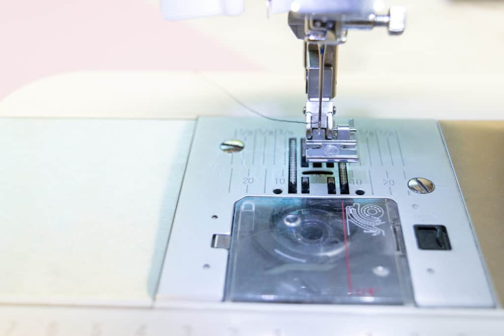 put a zipper foot on your sewing machine