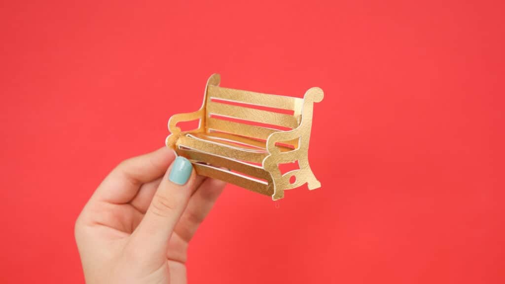 Assemble park bench from Paper Christmas Village