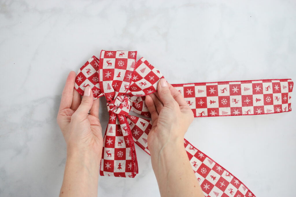 How to tie a Christmas bow with ribbon
