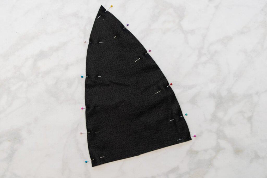 the witch hat pinned along the 2 long edges