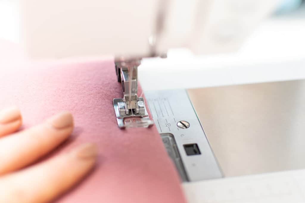 a close up of a sewing machine presser foot