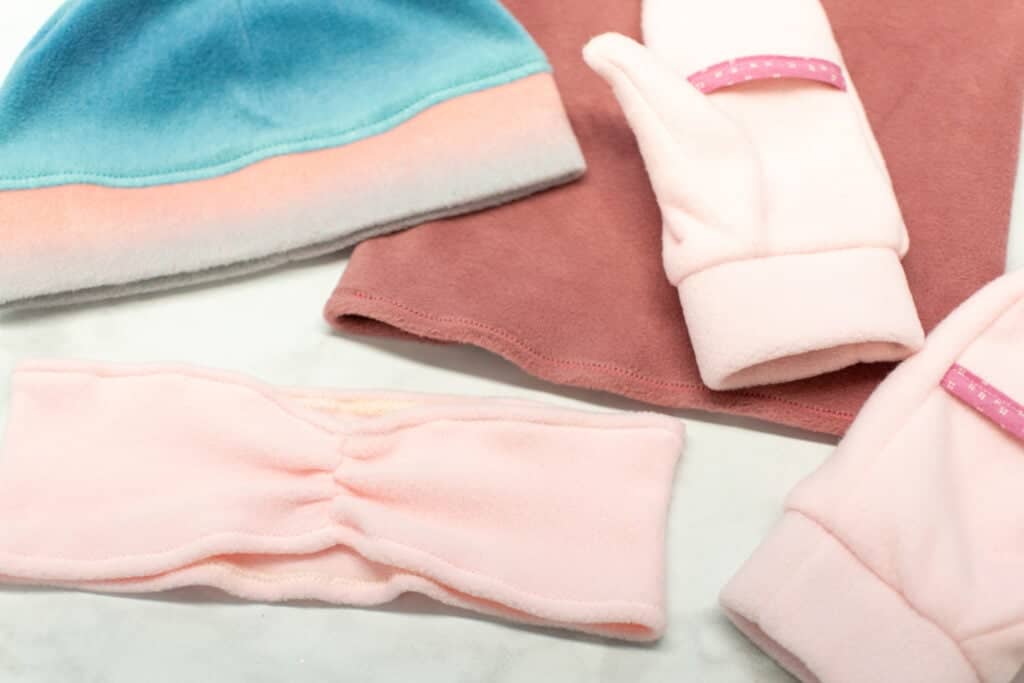 various fleece items on a white backdrop