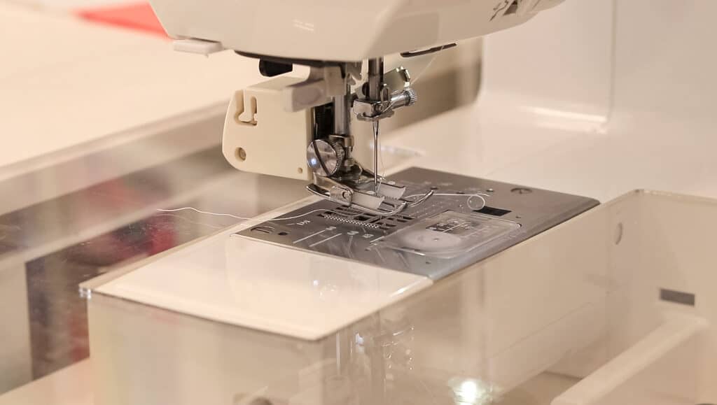 a walking foot on a sewing machine